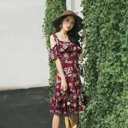  花色甜美纽扣针织花苞裙