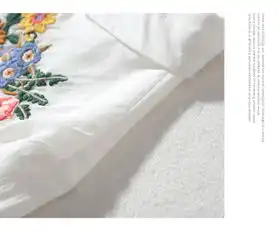  施悦名2019春夏新款翻领重工花朵刺绣单排扣长袖宽松中长款棉麻衬衫上衣女a